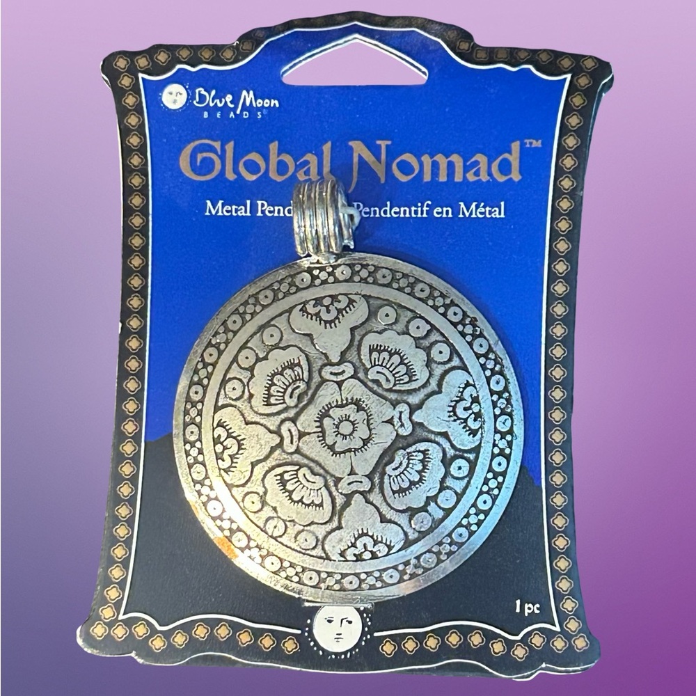 Set of 3 “Global Nomad” silver pendants made in India; flower design